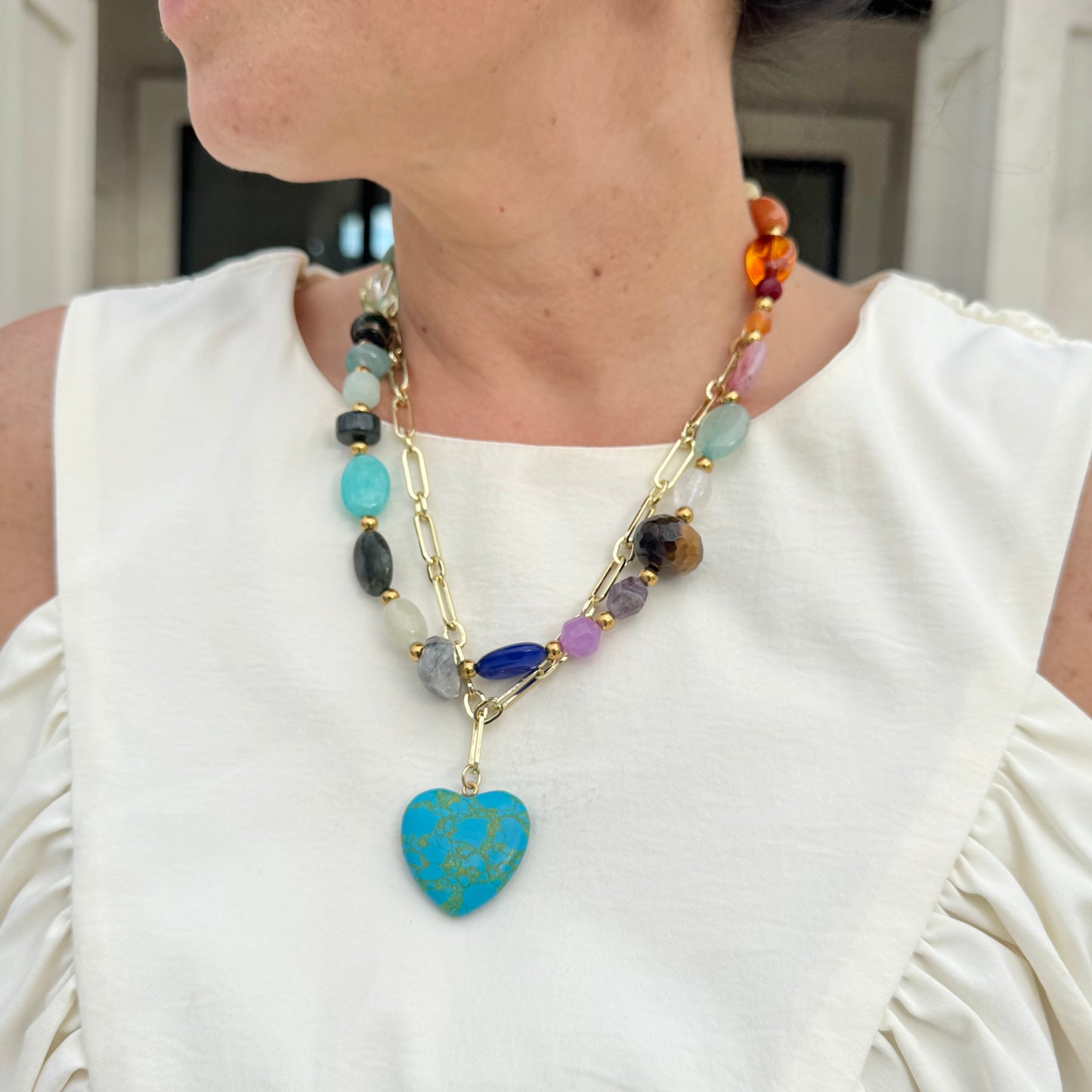 Colorful charms gold necklace featuring gemstone details, layered jewelry design, trendy accessory for women’s jewelry collections, boutique wholesale fashion necklace that is hypoallergenic, tarnish free, and waterproof jewelry with a cute aesthetic statement style