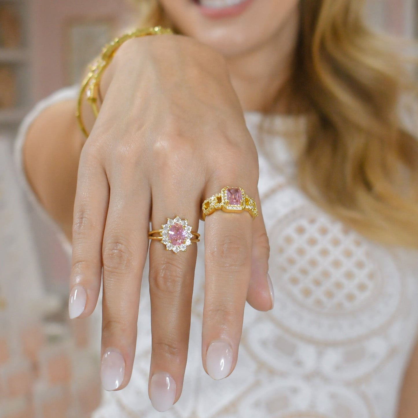 gold band with pink stone, adjustable crystal piece, faceted pink jewel, gold accessory with sparkle, pastel gemstone accent, luminous gold design, pink centerpiece detail, shimmering gold setting, soft-tone crystal feature, elegant gold style, pastel gem highlight, refined crystal accessory