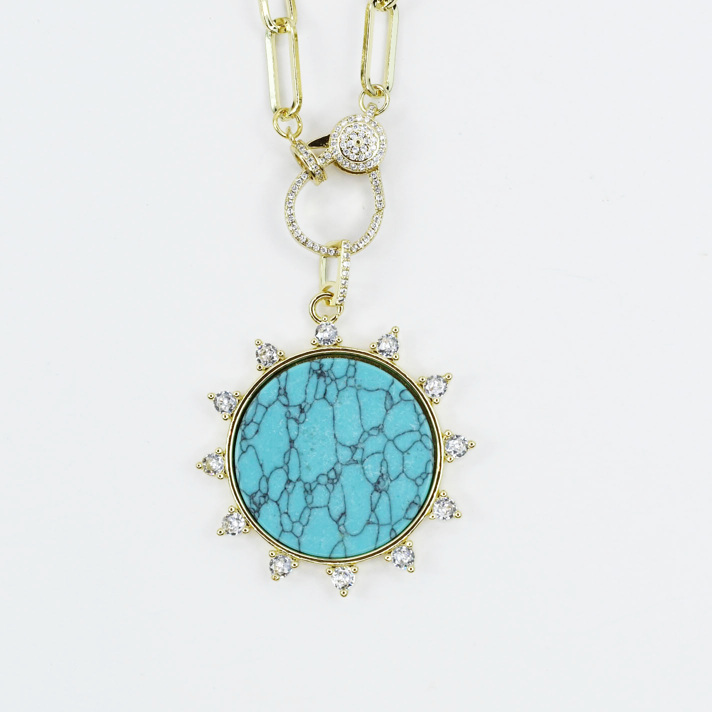 Gold necklace with turquoise sun pendant, round turquoise stone surrounded by crystal sun rays, trendy boutique jewelry, waterproof gold necklace, hypoallergenic tarnish-free fashion jewelry, wholesale jewelry for women’s boutiques