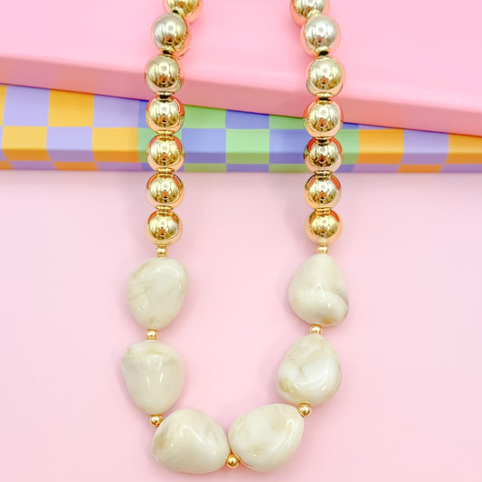 It's a Neutral Beaded Necklace