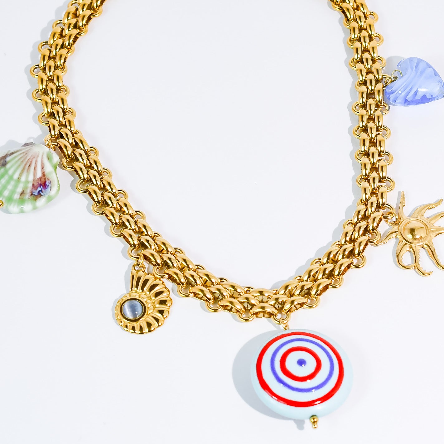 Colorful charms gold necklace featuring gemstone details, layered jewelry design, trendy accessory for women’s jewelry collections, boutique wholesale fashion necklace that is hypoallergenic, tarnish free, and waterproof jewelry with a cute aesthetic statement style