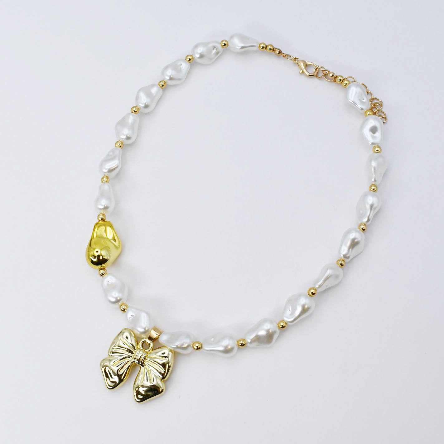 dainty gold necklace, layered design, boutique wholesale, women’s accessories, statement piece, trendy style, waterproof, hypoallergenic, tarnish free