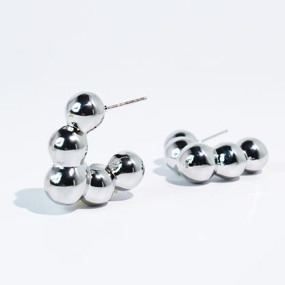 waterproof hypoallergenic silver earrings, tarnish free silver jewelry, dainty silver earrings, silver hoop earrings, handcrafted gemstone silver earrings, boutique wholesale earrings, everyday silver jewelry, high-quality silver earrings