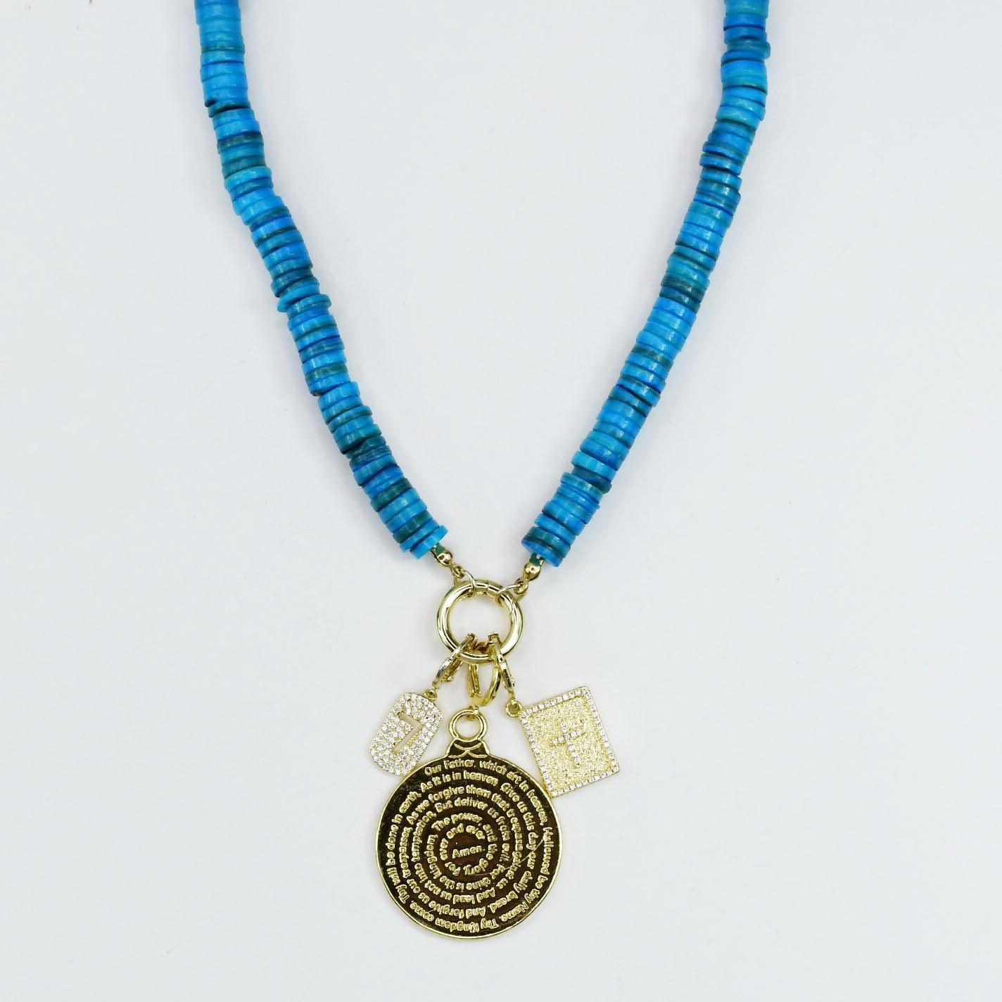 Colorful charms gold necklace featuring gemstone details, layered jewelry design, trendy accessory for women’s jewelry collections, boutique wholesale fashion necklace that is hypoallergenic, tarnish free, and waterproof jewelry with a cute aesthetic statement style