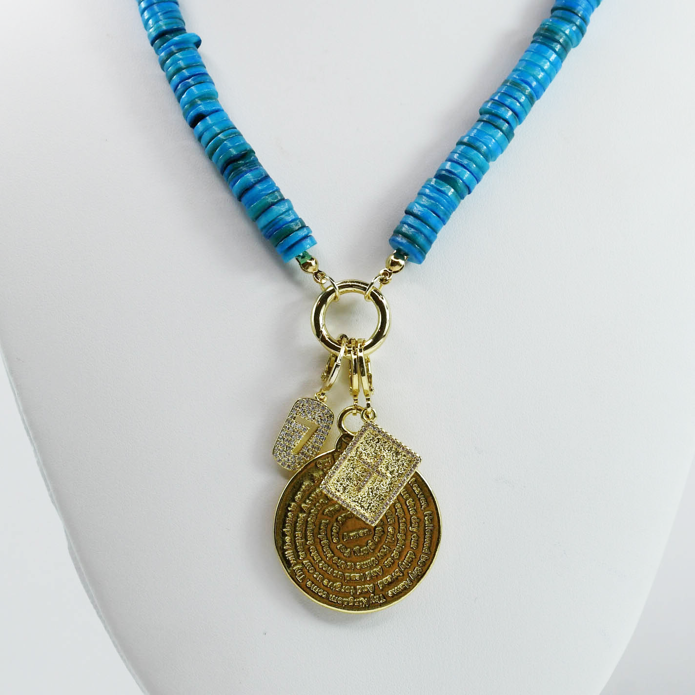 Colorful charms gold necklace featuring gemstone details, layered jewelry design, trendy accessory for women’s jewelry collections, boutique wholesale fashion necklace that is hypoallergenic, tarnish free, and waterproof jewelry with a cute aesthetic statement style