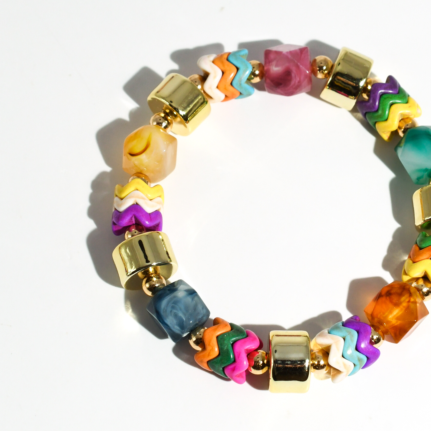 colorful gemstone jewelry, beaded fashion bracelet, gold or silver tone accessory, handcrafted beaded piece, trendy boho chic jewelry, vibrant statement wristwear, artisan handmade design, everyday stackable accessory, fashion jewelry for women, premium jewelry gift idea, boutique style wristwear, elevated modern jewelry