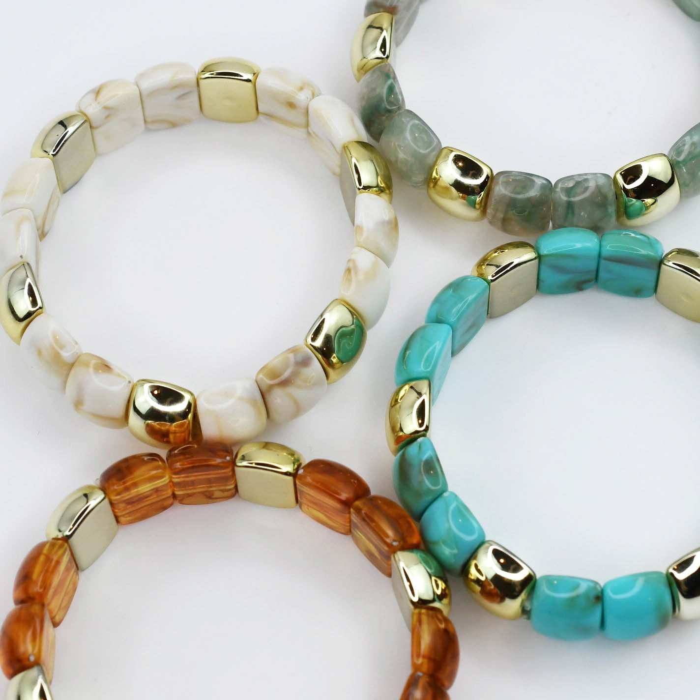 colorful gemstone jewelry, beaded fashion bracelet, gold or silver tone accessory, handcrafted beaded piece, trendy boho chic jewelry, vibrant statement wristwear, artisan handmade design, everyday stackable accessory, fashion jewelry for women, premium jewelry gift idea, boutique style wristwear, elevated modern jewelry