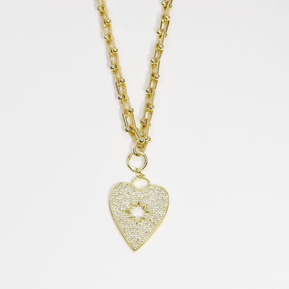 Dainty gold necklace with sparkly heart pendant and star cutout, waterproof tarnish-free hypoallergenic jewelry, trendy statement accessory for women’s boutiques, wholesale jewelry