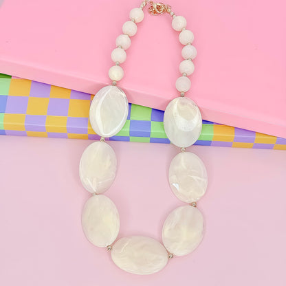 Colorful charms gold necklace featuring gemstone details, layered jewelry design, trendy accessory for women’s jewelry collections, boutique wholesale fashion necklace that is hypoallergenic, tarnish free, and waterproof jewelry with a cute aesthetic statement style
