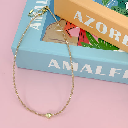 Tiny Gold Heartbeat Necklace