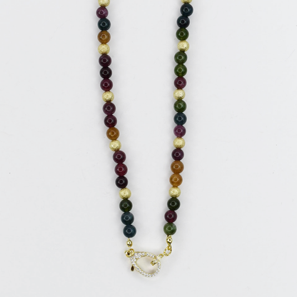 Colorful charms gold necklace featuring gemstone details, layered jewelry design, trendy accessory for women’s jewelry collections, boutique wholesale fashion necklace that is hypoallergenic, tarnish free, and waterproof jewelry with a cute aesthetic statement style,tiger eye tones
