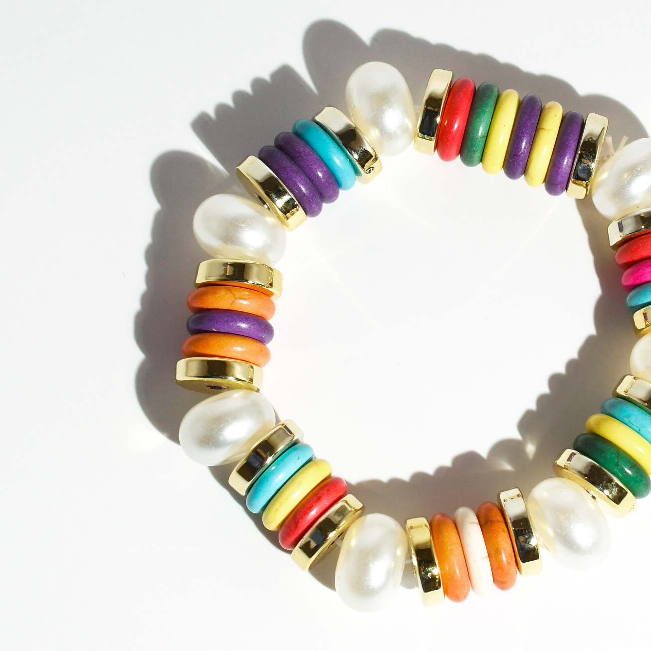 colorful gemstone jewelry, beaded fashion bracelet, gold or silver tone accessory, handcrafted beaded piece, trendy boho chic jewelry, vibrant statement wristwear, artisan handmade design, everyday stackable accessory, fashion jewelry for women, premium jewelry gift idea, boutique style wristwear, elevated modern jewelry