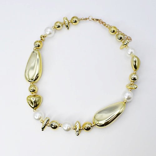 dainty gold necklace, layered design, boutique wholesale, women’s accessories, statement piece, trendy style, waterproof, hypoallergenic, tarnish free