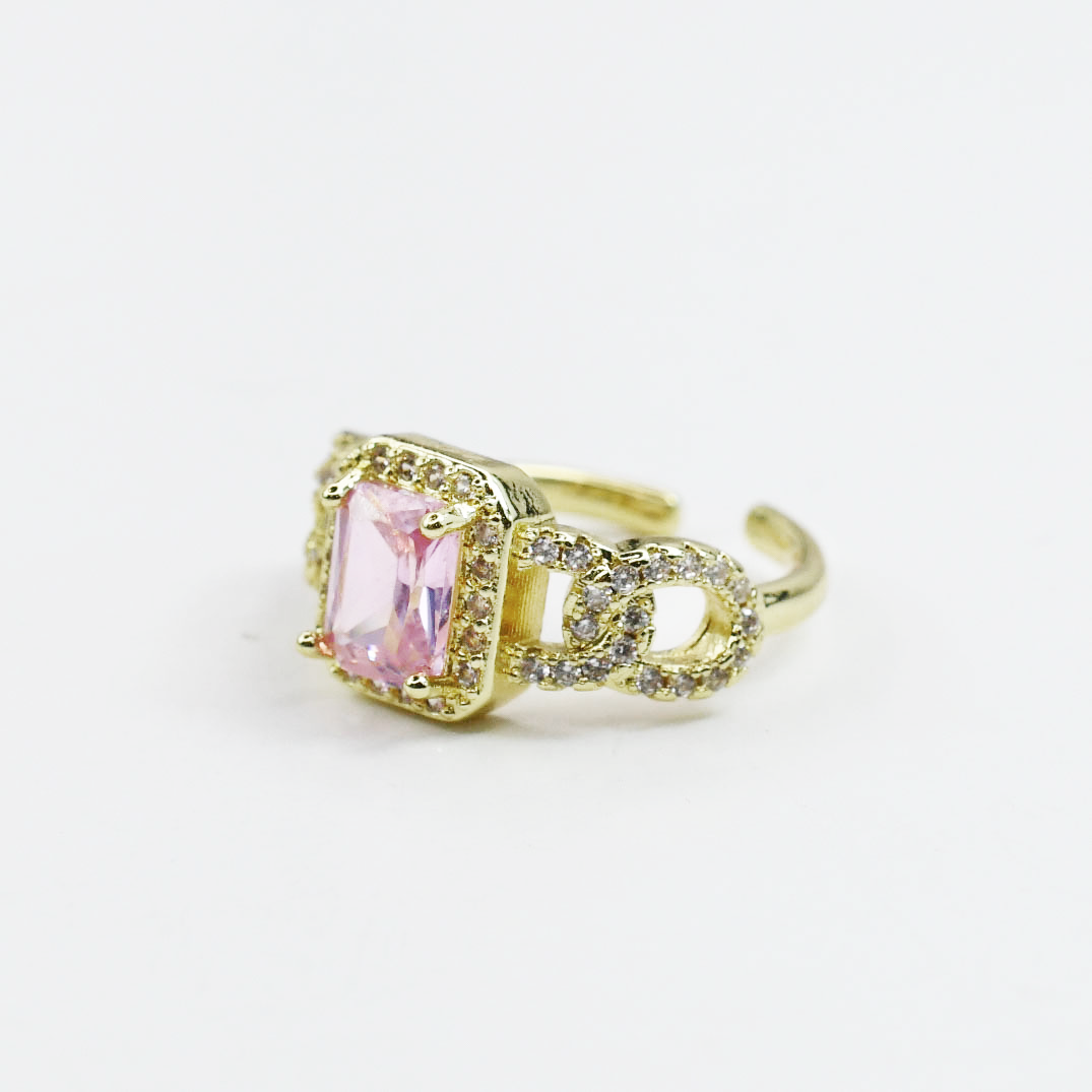 gold band with pink stone, adjustable crystal piece, faceted pink jewel, gold accessory with sparkle, pastel gemstone accent, luminous gold design, pink centerpiece detail, shimmering gold setting, soft-tone crystal feature, elegant gold style, pastel gem highlight, refined crystal accessory