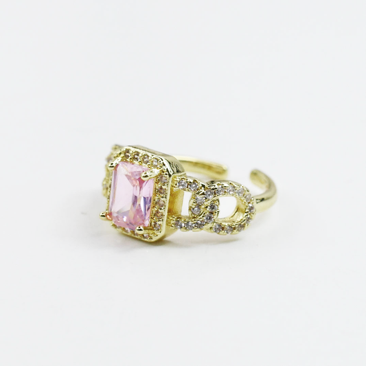 gold band with pink stone, adjustable crystal piece, faceted pink jewel, gold accessory with sparkle, pastel gemstone accent, luminous gold design, pink centerpiece detail, shimmering gold setting, soft-tone crystal feature, elegant gold style, pastel gem highlight, refined crystal accessory