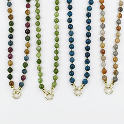 Colorful charms gold necklace featuring gemstone details, layered jewelry design, trendy accessory for women’s jewelry collections, boutique wholesale fashion necklace that is hypoallergenic, tarnish free, and waterproof jewelry with a cute aesthetic statement style