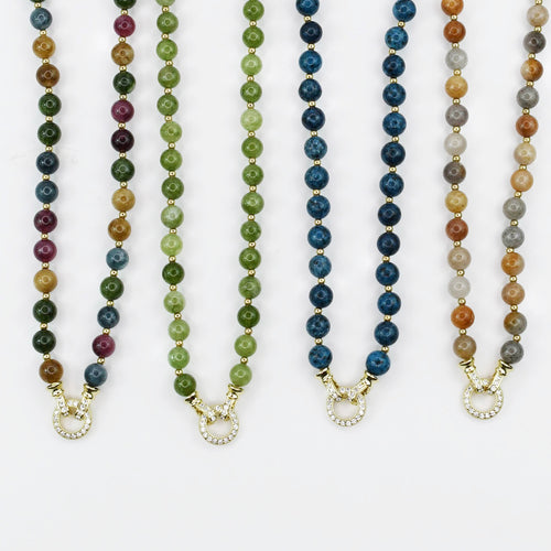 Colorful charms gold necklace featuring gemstone details, layered jewelry design, trendy accessory for women’s jewelry collections, boutique wholesale fashion necklace that is hypoallergenic, tarnish free, and waterproof jewelry with a cute aesthetic statement style