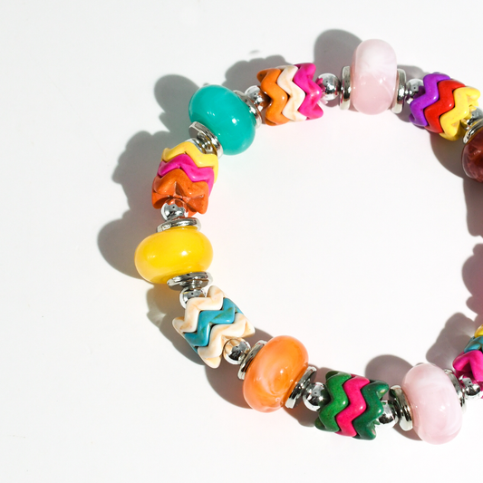 colorful gemstone jewelry, beaded fashion bracelet, gold or silver tone accessory, handcrafted beaded piece, trendy boho chic jewelry, vibrant statement wristwear, artisan handmade design, everyday stackable accessory, fashion jewelry for women, premium jewelry gift idea, boutique style wristwear, elevated modern jewelry