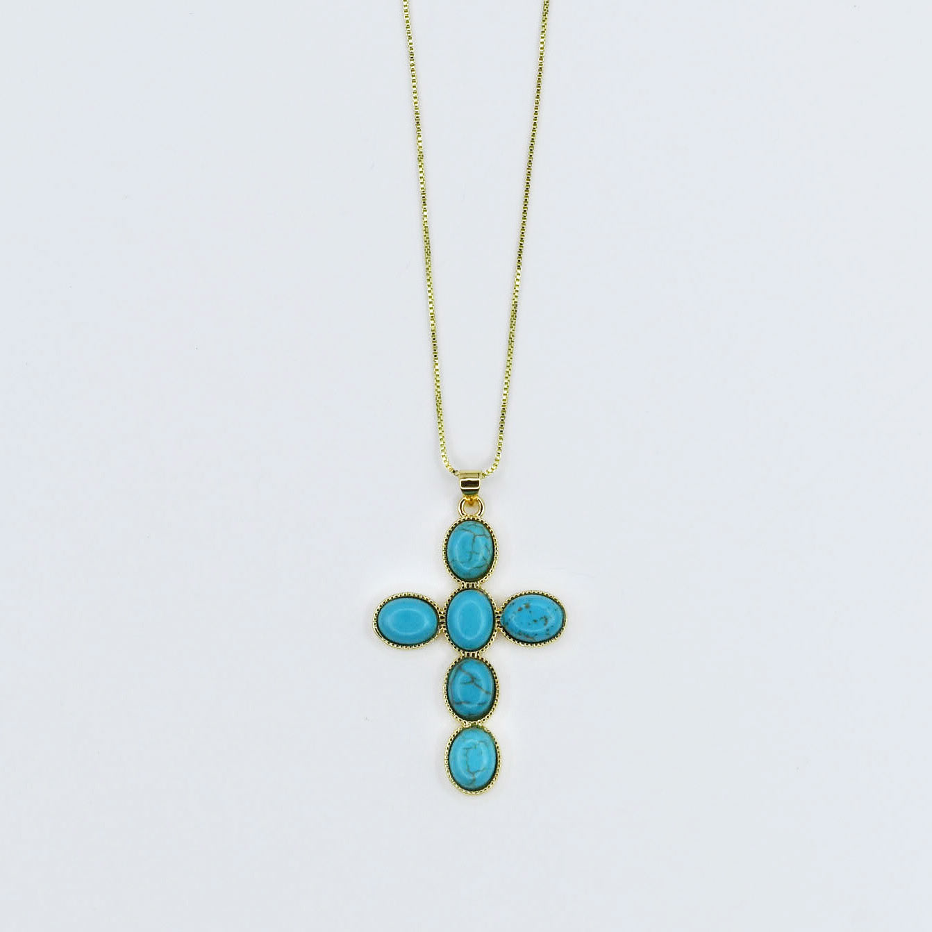 Gold necklace with turquoise cross pendant, boutique wholesale jewelry for women, boho statement accessory, waterproof and hypoallergenic necklace, tarnish-free gold chain, trendy turquoise pendant jewelry for stylish women’s boutiques