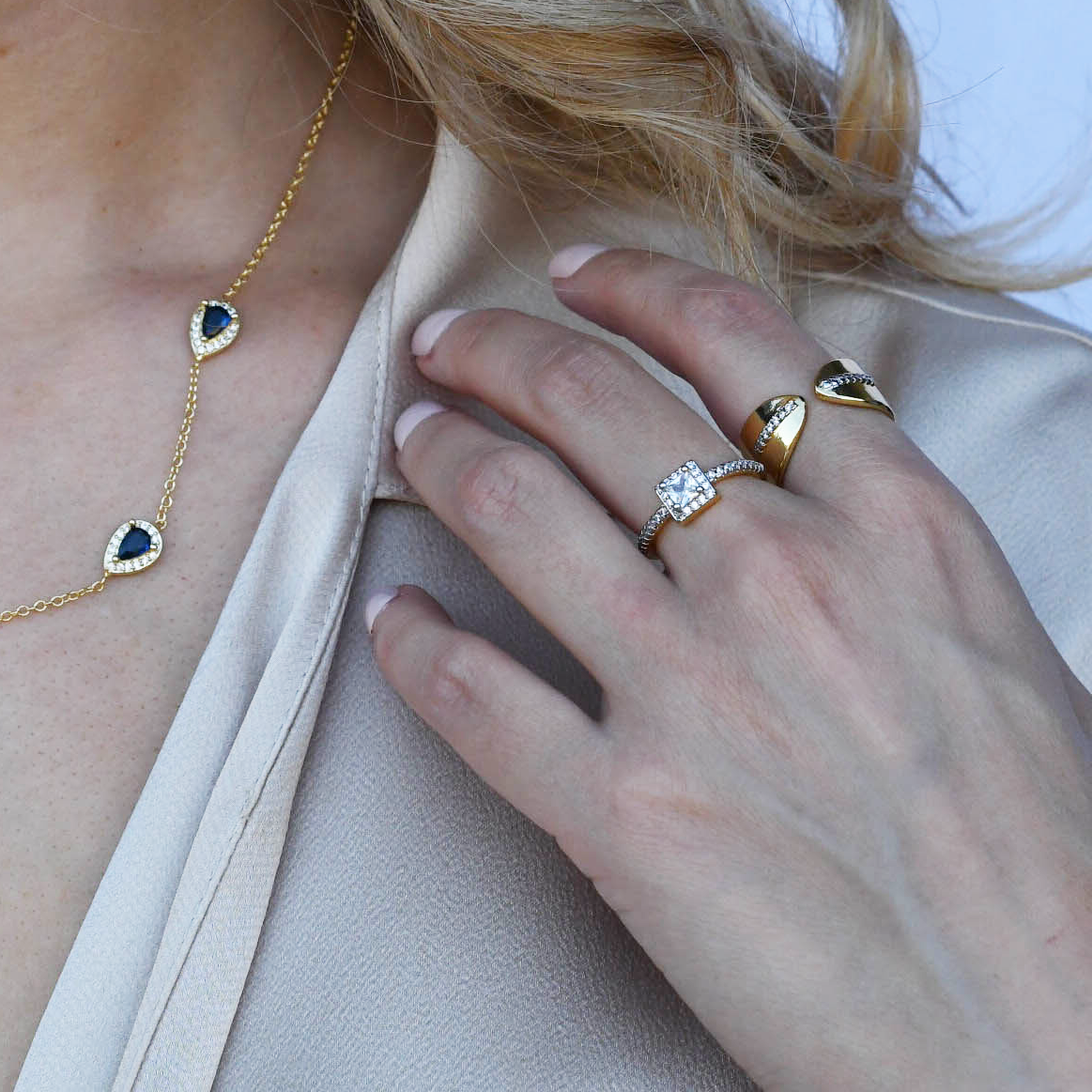 hypoallergenic ring, waterproof ring, tarnish free jewelry, boutique wholesale jewelry, dainty gold ring, gemstone statement ring, sparkly cubic zirconia ring, high quality jewelry gifts, elegant gold plated ring, trendy fashion ring, pastel gemstone ring