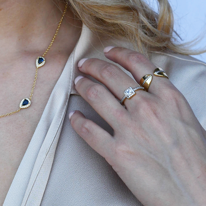 hypoallergenic ring, waterproof ring, tarnish free jewelry, boutique wholesale jewelry, dainty gold ring, gemstone statement ring, sparkly cubic zirconia ring, high quality jewelry gifts, elegant gold plated ring, trendy fashion ring, pastel gemstone ring