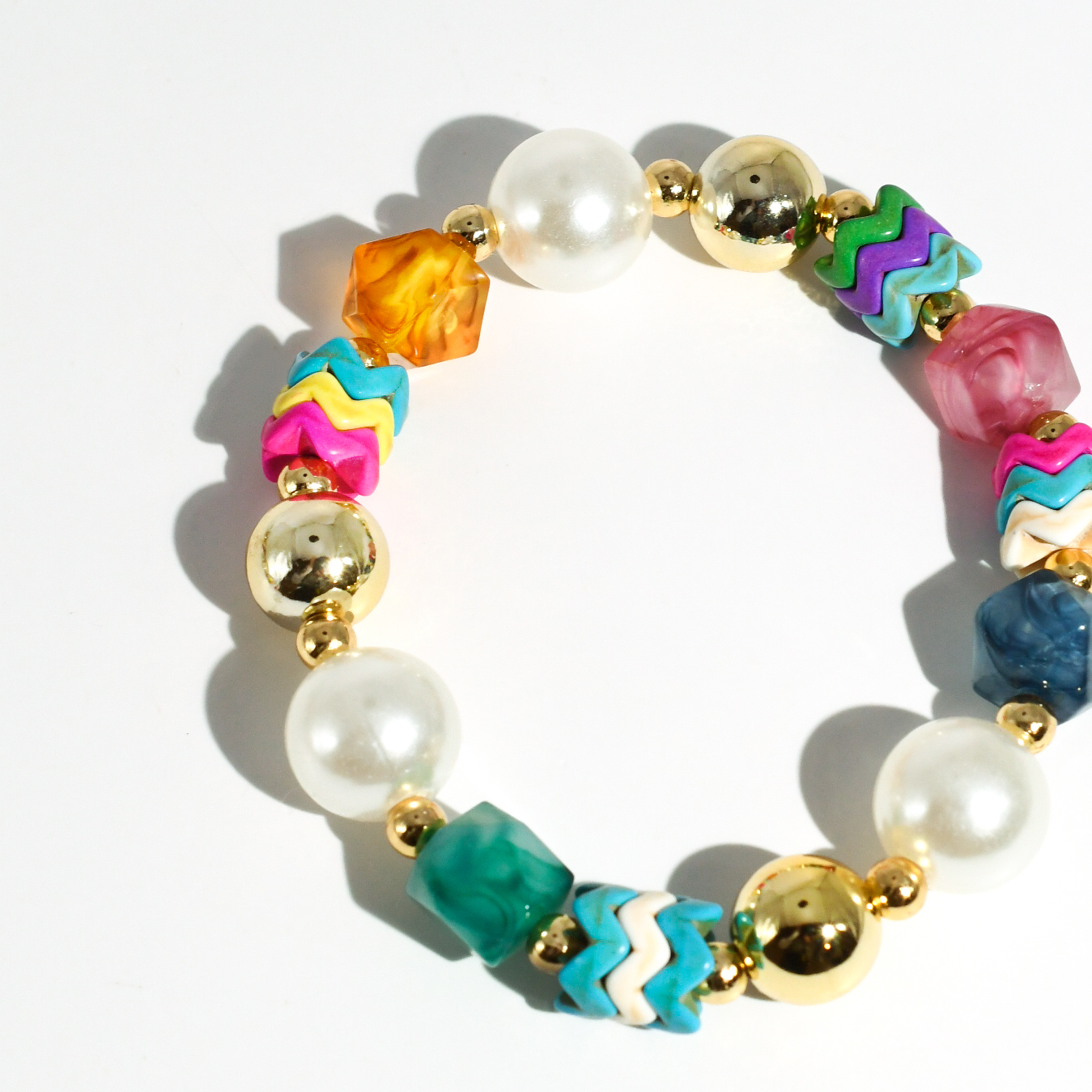 colorful gemstone jewelry, beaded fashion bracelet, gold or silver tone accessory, handcrafted beaded piece, trendy boho chic jewelry, vibrant statement wristwear, artisan handmade design, everyday stackable accessory, fashion jewelry for women, premium jewelry gift idea, boutique style wristwear, elevated modern jewelry